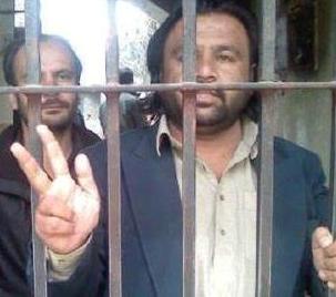 Gilgit: Baba Jan is seen behind the bars along with Iftikhar Hussain in a file photo 