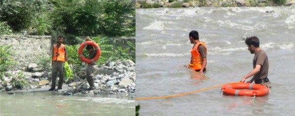 Workers of Rescue 1122 searching for the drowned boys near Sonikot, Gilgit