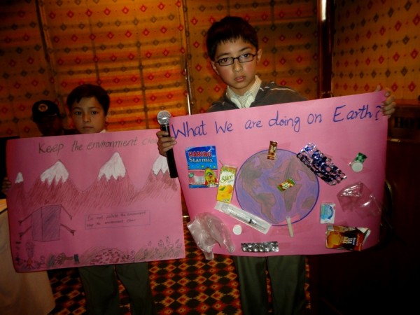 Children presenting their posters at a session in Gilgit Serena 