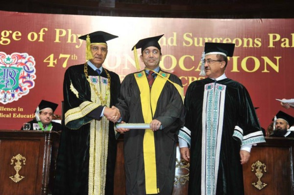 Dr. Inaam Baig receiving his second FRCS degree 