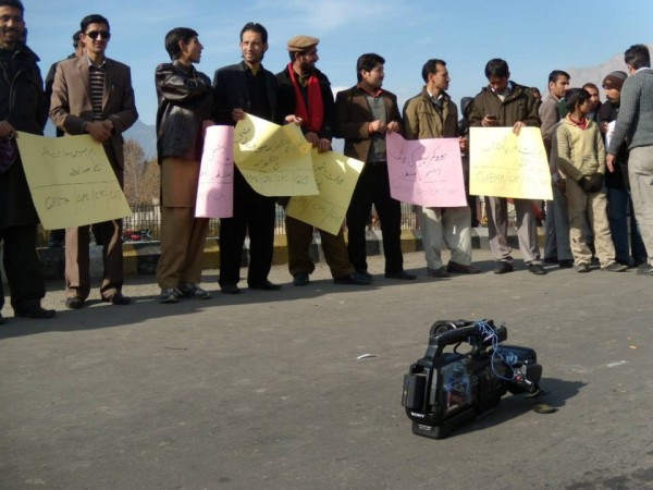 The local journalists staging a protest demonstration in front of Gilgit Airport. Ab Tak Photo