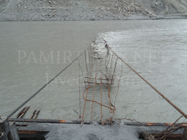 A partially resurfaced view of the suspension bridge in Gulmit
