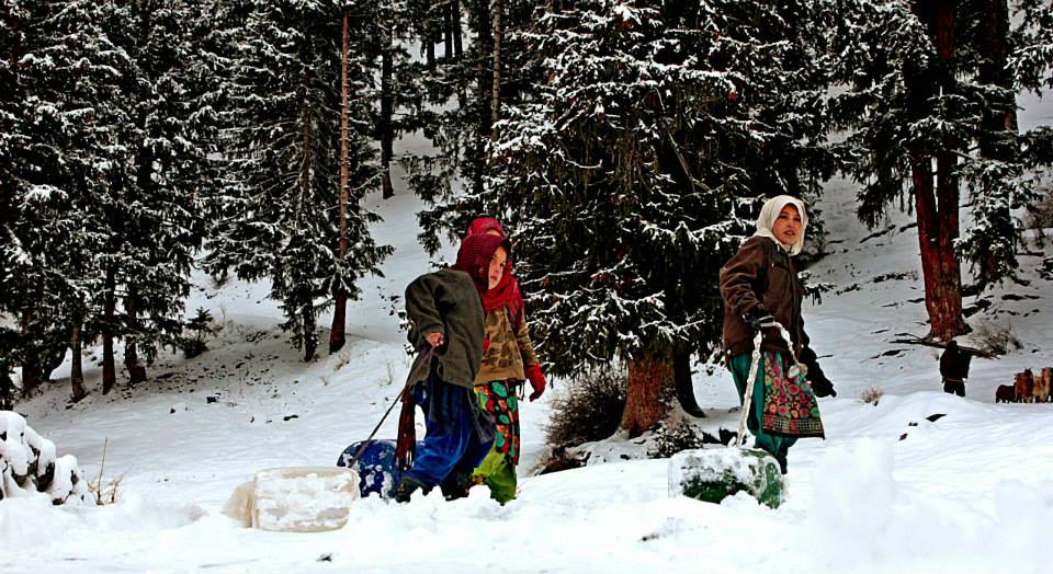 Life in the valley is difficult for the locals because of lack of facilities. Women, men and girls have to fetch water in the severe cold from sources located away from their houses. Photo: M Amin Zia 