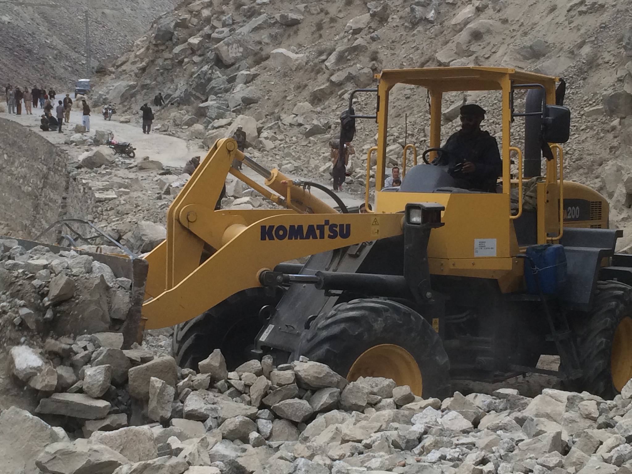 District officials busy repairing a road in Ghizar district 
