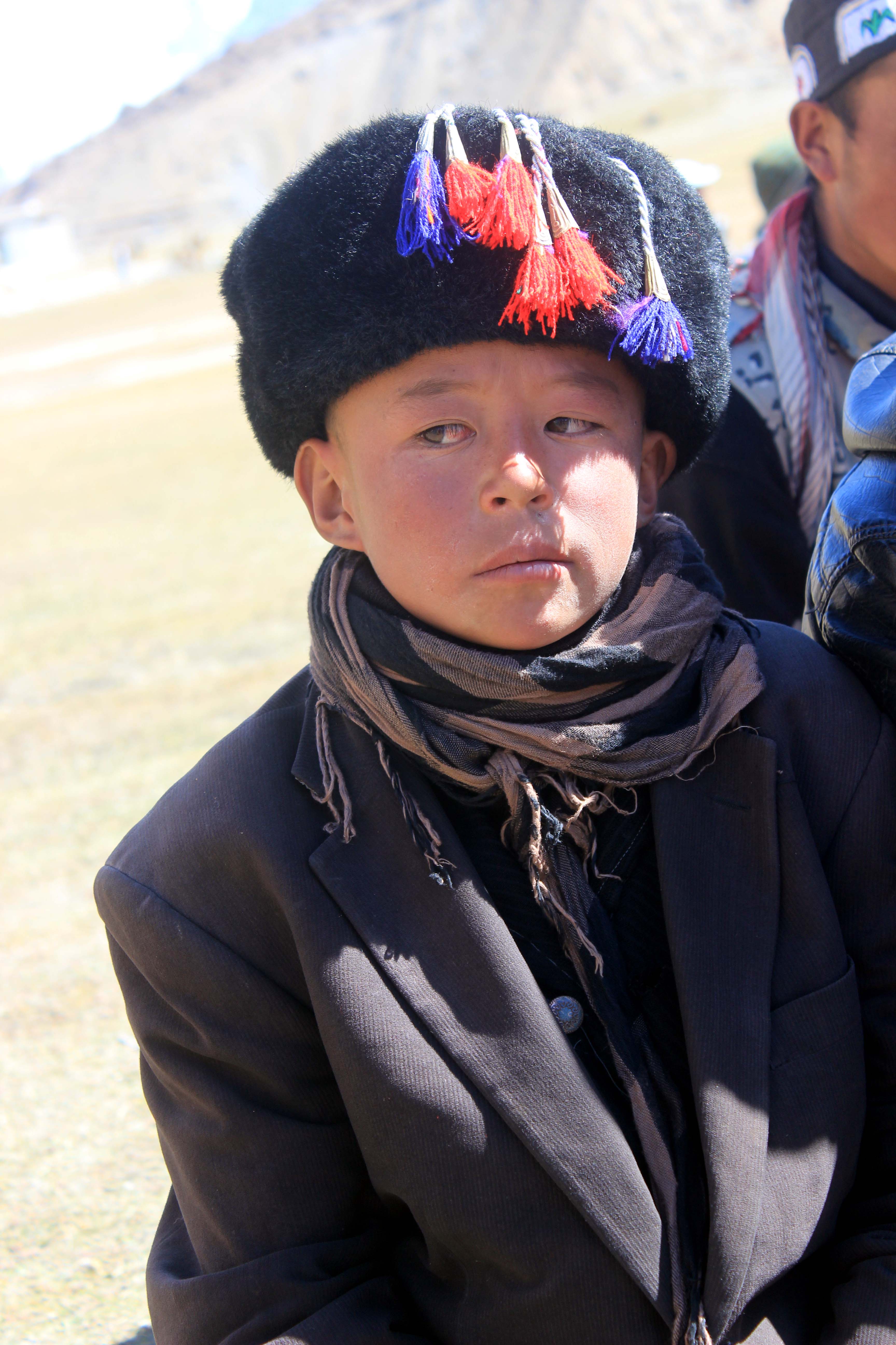 A Kirghiz child who came to attend the festival with his parents 
