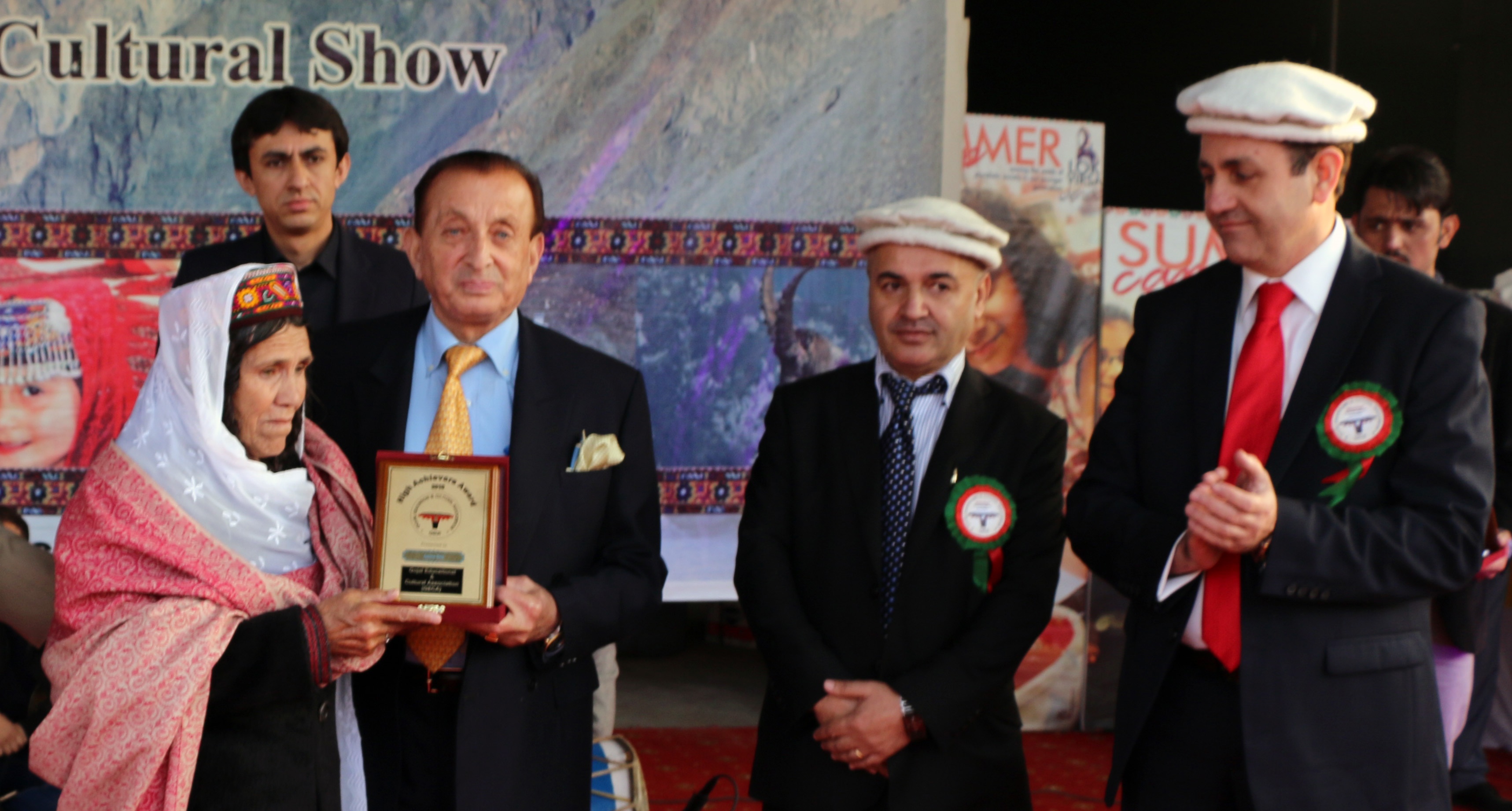 Islamabad: Mother of mountaineer Samina Baig receives an award on her daughter's behalf from Governor Mir Ghazanfar Ali Khan 