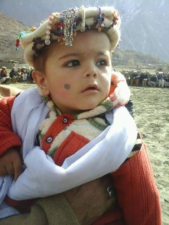 A child prepared for the occasion in Ghulkin village