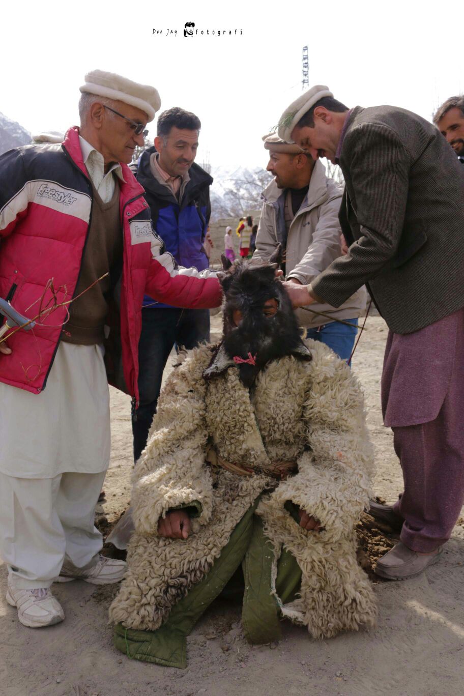 A man dressed to appear as an Oxen is being prepared for the show. Photo: Deedar Ali 